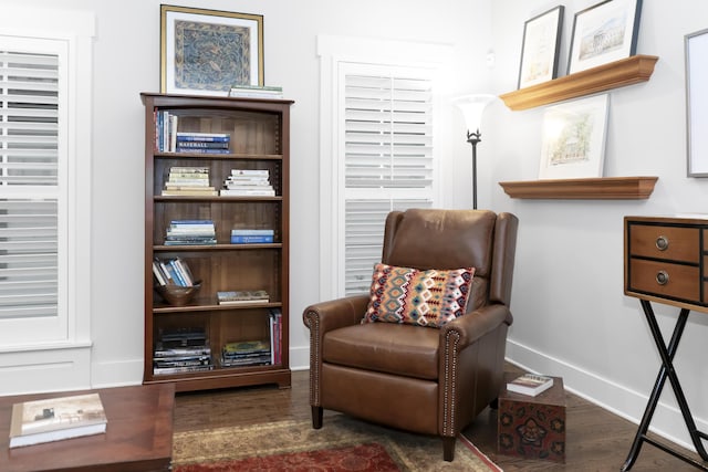 sitting room featuring wood finished floors and baseboards