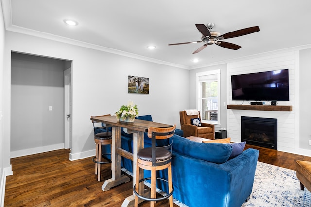 9876 Trestle Cir, Ooltewah, TN 37363 - living room with dark wood-style floors, baseboards, a ceiling fan, a fireplace, and ornamental molding