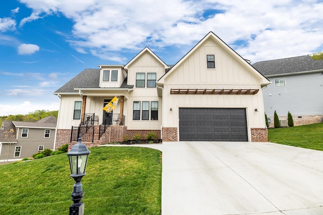 9876 Trestle Cir, Ooltewah, TN 37363 - modern farmhouse style home with concrete driveway, brick siding, board and batten siding, and a front yard