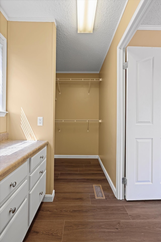325 Pocket Rd, Whitwell, TN 37397 - spacious closet with dark wood-style floors and visible vents