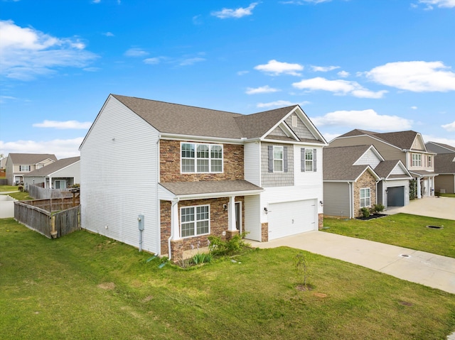 127 Huntley Meadows Dr, Rossville, GA 30741 - traditional home featuring driveway, fence, an attached garage, and a front lawn