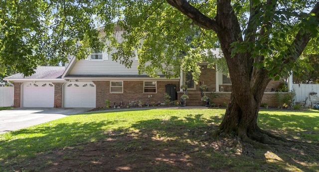 view of front of house featuring concrete driveway, brick siding, and an attached garage