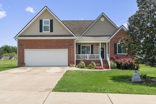 craftsman house featuring covered porch, brick siding, concrete driveway, and a front yard