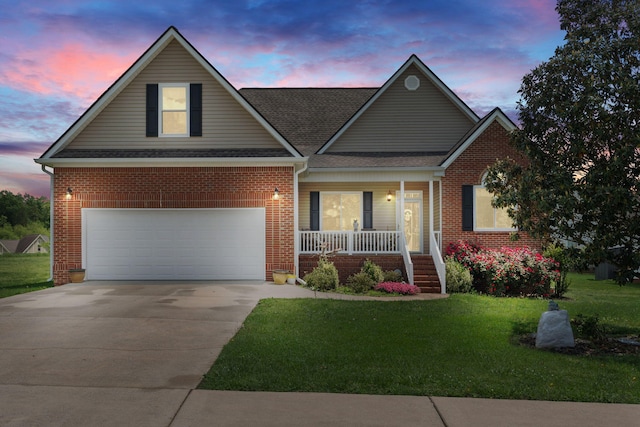 view of front of house featuring concrete driveway, a porch, a front lawn, and brick siding