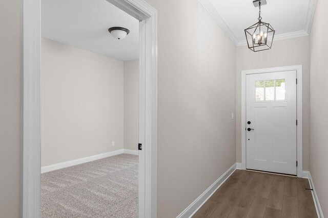 1555 Whisper Winds Ln Unit 44, Ooltewah, TN 37363 - entryway with a chandelier, crown molding, and wood finished floors
