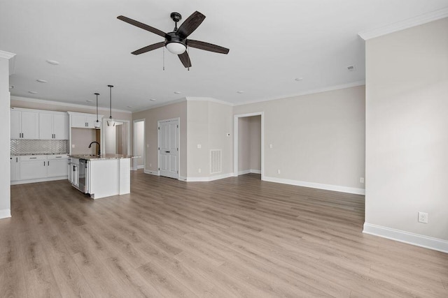 1555 Whisper Winds Ln Unit 44, Ooltewah, TN 37363 - unfurnished living room featuring ornamental molding, ceiling fan, light wood-style floors, and recessed lighting