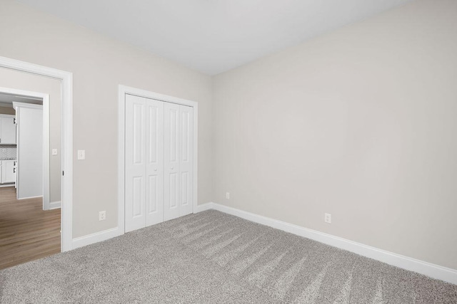 1555 Whisper Winds Ln Unit 44, Ooltewah, TN 37363 - unfurnished bedroom with carpet flooring and a closet