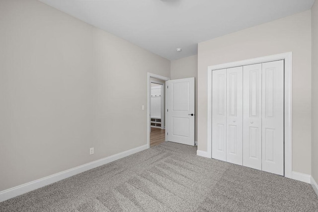 1555 Whisper Winds Ln Unit 44, Ooltewah, TN 37363 - unfurnished bedroom featuring carpet flooring and a closet