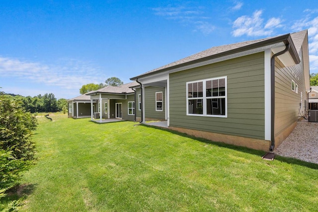 1555 Whisper Winds Ln Unit 44, Ooltewah, TN 37363 - rear view of house with a patio and a yard