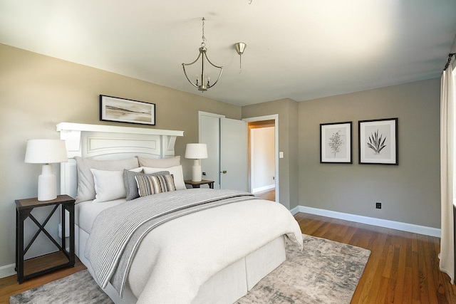 5410 Sunny Dell Ln, Chattanooga, TN 37412 - bedroom with dark wood-type flooring and a chandelier