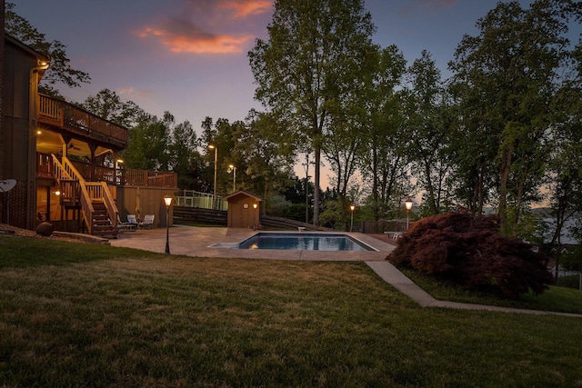 6500 Waconda Point Rd, Harrison, TN 37341 - outdoor pool featuring stairs, a storage shed, a wooden deck, a patio area, and an outbuilding