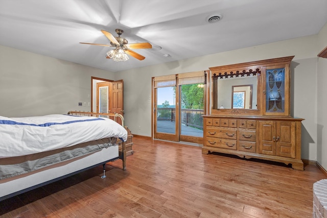 6500 Waconda Point Rd, Harrison, TN 37341 - bedroom featuring baseboards, visible vents, light wood-style floors, access to outside, and ceiling fan