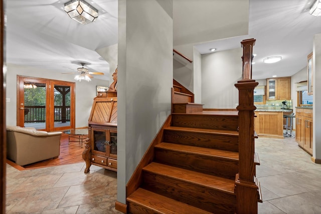 6500 Waconda Point Rd, Harrison, TN 37341 - stairs featuring ceiling fan, baseboards, stone finish floor, and recessed lighting