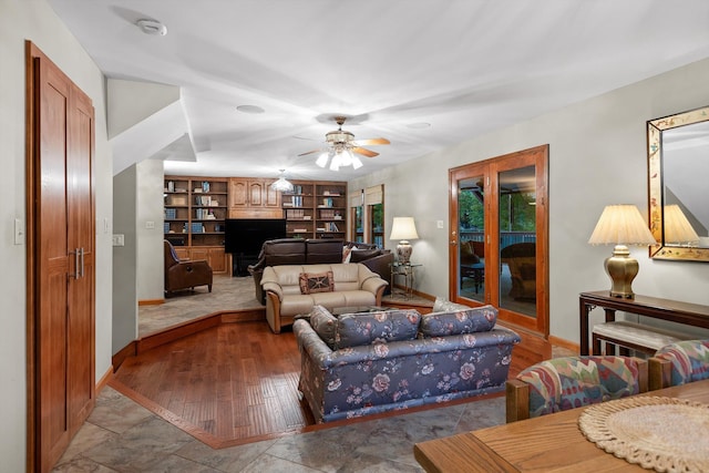 6500 Waconda Point Rd, Harrison, TN 37341 - living area featuring baseboards, built in features, and ceiling fan