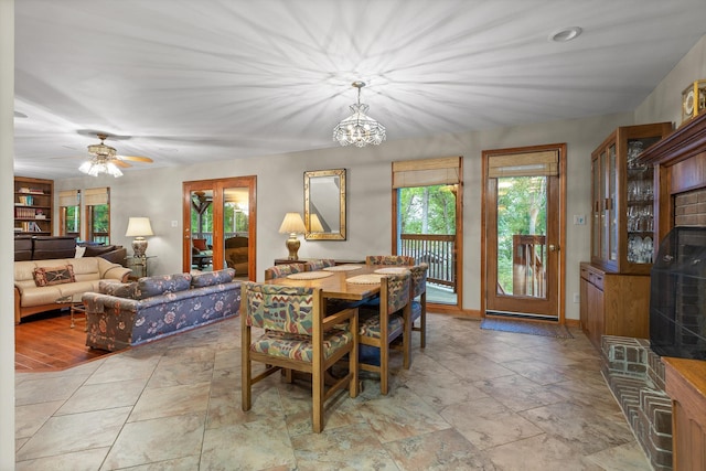 6500 Waconda Point Rd, Harrison, TN 37341 - dining area featuring ceiling fan with notable chandelier