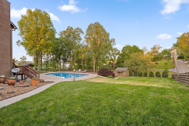 6500 Waconda Point Rd, Harrison, TN 37341 - view of pool with a fenced in pool, a fenced backyard, a shed, an outbuilding, and a lawn