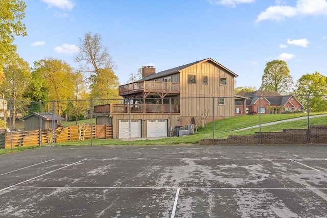 6500 Waconda Point Rd, Harrison, TN 37341 - exterior space with fence, a yard, board and batten siding, uncovered parking, and a deck