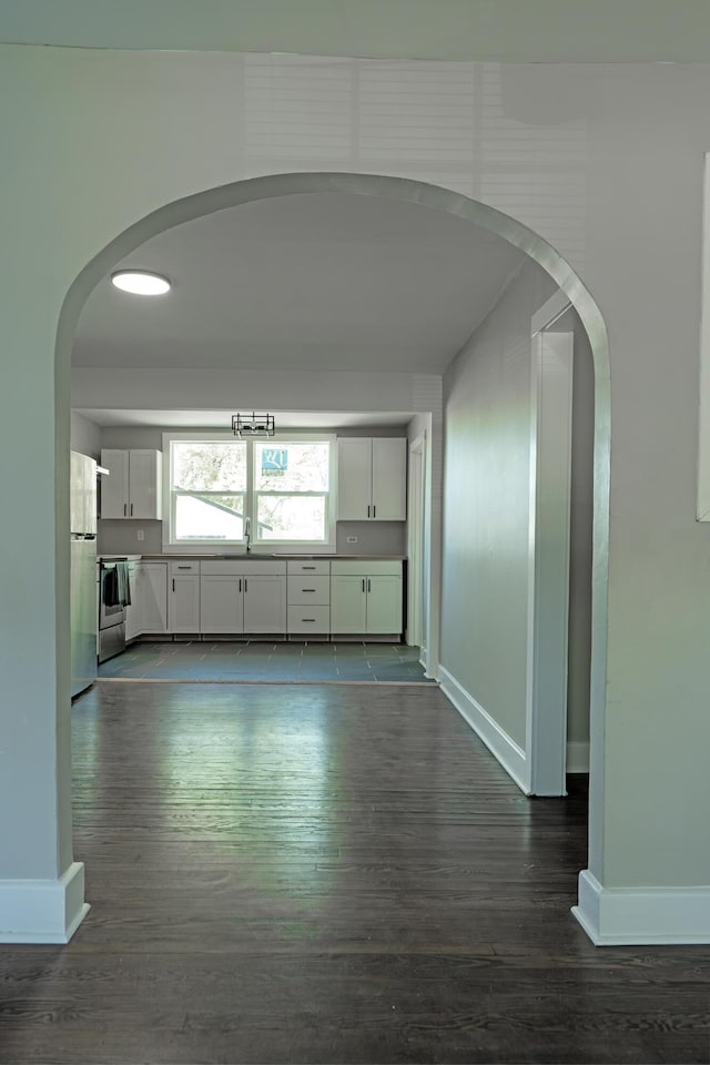 3 Whirlaway Dr, Chattanooga, TN 37421 - hallway with dark wood-type flooring and baseboards