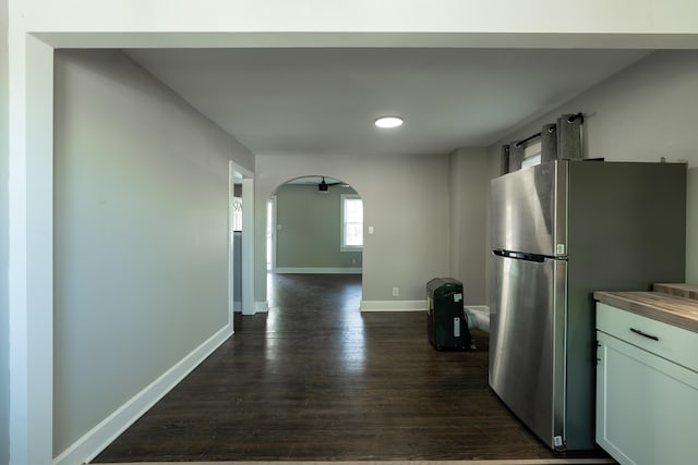 3 Whirlaway Dr, Chattanooga, TN 37421 - kitchen with baseboards, arched walkways, dark wood-style flooring, freestanding refrigerator, and recessed lighting