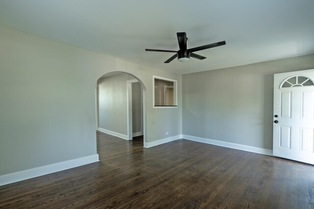 3 Whirlaway Dr, Chattanooga, TN 37421 - spare room featuring arched walkways, dark wood-style floors, baseboards, and ceiling fan
