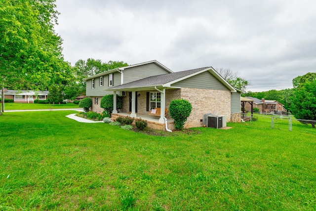 14 Hillcrest Ct, Ringgold, GA 30736 - view of side of home featuring brick siding, covered porch, central AC unit, and a shingled roof