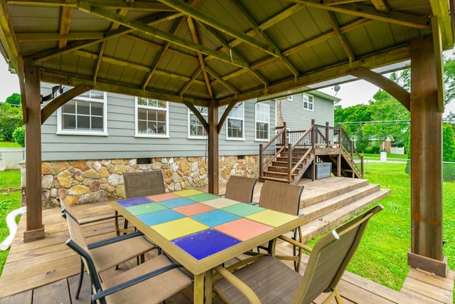 14 Hillcrest Ct, Ringgold, GA 30736 - wooden terrace featuring outdoor dining area, a gazebo, stairway, and a lawn