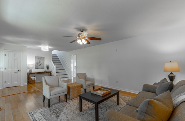 14 Hillcrest Ct, Ringgold, GA 30736 - living room with stairway, a ceiling fan, wood finished floors, and baseboards
