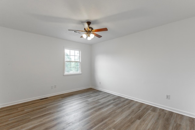 14 Hillcrest Ct, Ringgold, GA 30736 - empty room with ceiling fan, wood finished floors, and baseboards