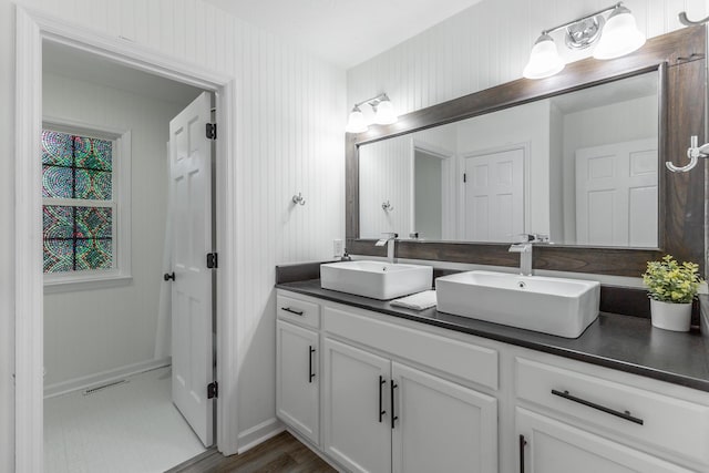 14 Hillcrest Ct, Ringgold, GA 30736 - full bathroom with double vanity and wood finished floors