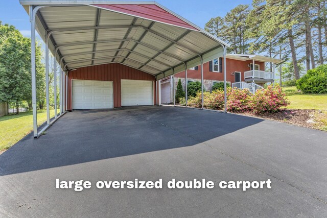 view of car parking featuring a detached garage