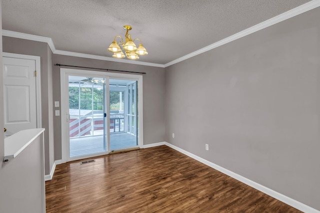 interior space with wood finished floors, an inviting chandelier, baseboards, visible vents, and a textured ceiling