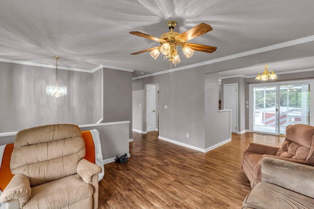 living room featuring a textured ceiling, wood finished floors, ceiling fan with notable chandelier, and baseboards