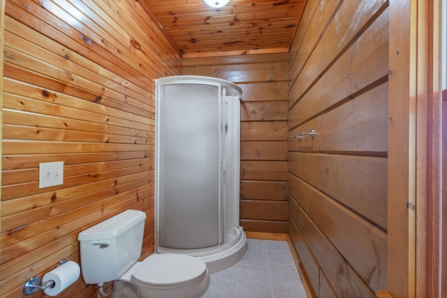 full bathroom with toilet, wood ceiling, a shower stall, wood walls, and tile patterned floors
