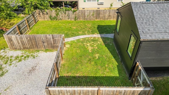 view of yard featuring a fenced backyard