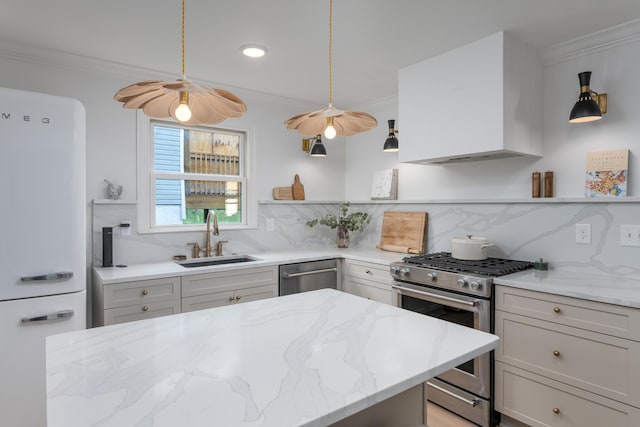 kitchen with crown molding, stainless steel appliances, a sink, and wall chimney exhaust hood