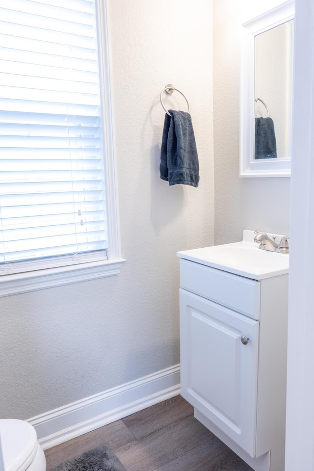 7845 Legacy Park Ct, Chattanooga, TN 37421 - half bathroom featuring vanity and wood finished floors