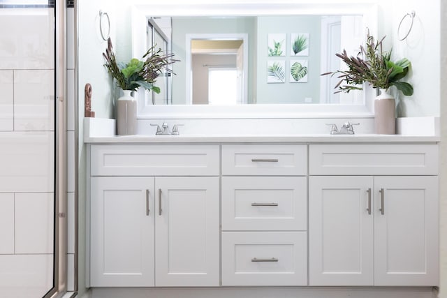 7845 Legacy Park Ct, Chattanooga, TN 37421 - full bathroom featuring double vanity and a shower with shower door