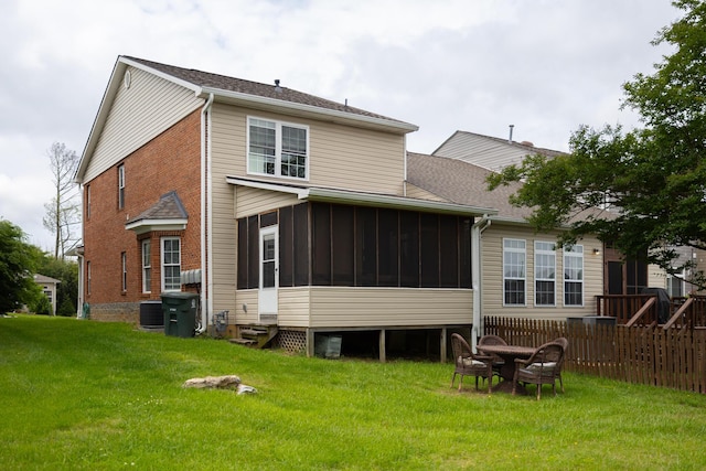 7845 Legacy Park Ct, Chattanooga, TN 37421 - rear view of property with a sunroom and a shingled roof
