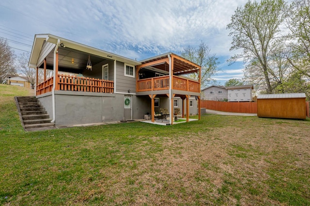 3745 Premium Dr, Chattanooga, TN 37415 - back of property with a lawn, a patio, an outdoor structure, and a shed