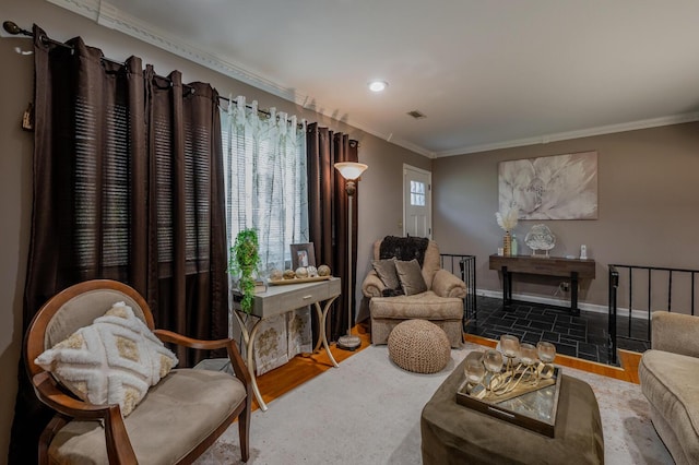 3745 Premium Dr, Chattanooga, TN 37415 - living area with baseboards, crown molding, wood finished floors, and visible vents