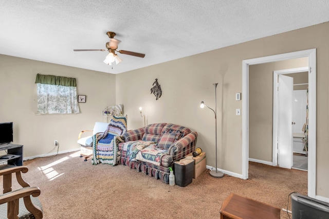 3300 Redding Rd, Chattanooga, TN 37415 - living room with baseboards, carpet floors, a textured ceiling, and ceiling fan