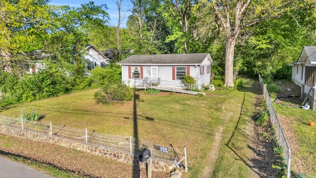 3300 Redding Rd, Chattanooga, TN 37415 - view of front of house with an outbuilding, a front yard, and fence
