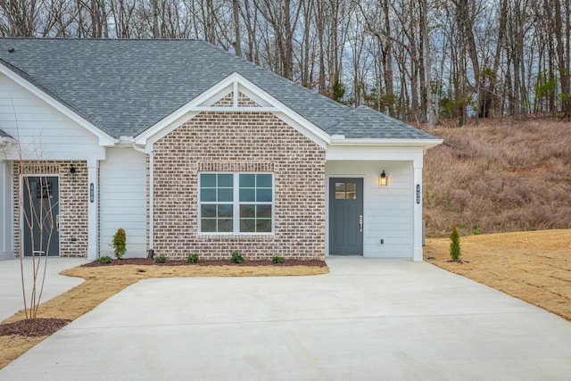 craftsman inspired home with a shingled roof