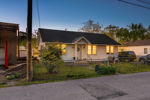 view of front facade with a fenced front yard