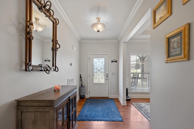 12237 Wildlife Pl, Soddy Daisy, TN 37379 - entryway featuring visible vents, baseboards, wood finished floors, and crown molding