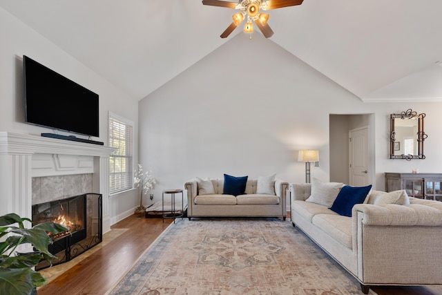 12237 Wildlife Pl, Soddy Daisy, TN 37379 - living room with a fireplace with flush hearth, light wood-type flooring, baseboards, a ceiling fan, and high vaulted ceiling