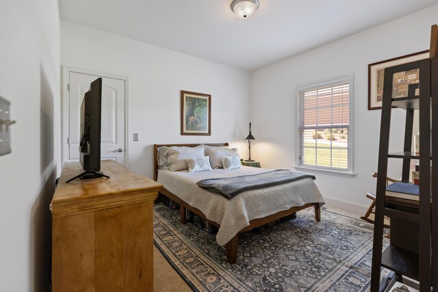 12237 Wildlife Pl, Soddy Daisy, TN 37379 - carpeted bedroom featuring baseboards