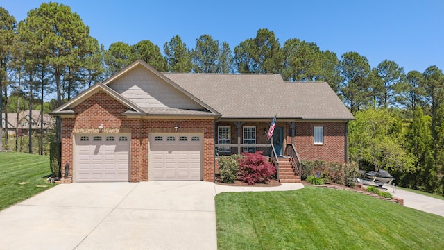 12237 Wildlife Pl, Soddy Daisy, TN 37379 - ranch-style home with concrete driveway, a front lawn, a porch, a garage, and brick siding