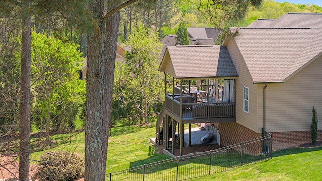 12237 Wildlife Pl, Soddy Daisy, TN 37379 - rear view of property featuring a lawn, a fenced backyard, and a deck