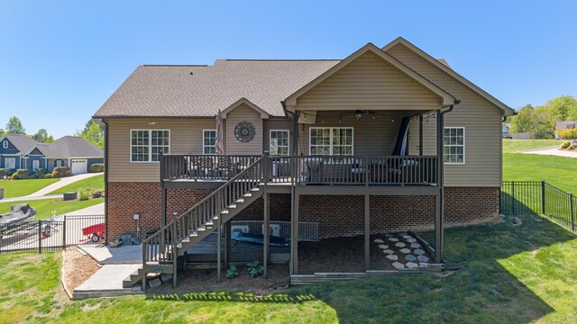 12237 Wildlife Pl, Soddy Daisy, TN 37379 - rear view of house with stairway, a patio area, a fenced backyard, and a yard
